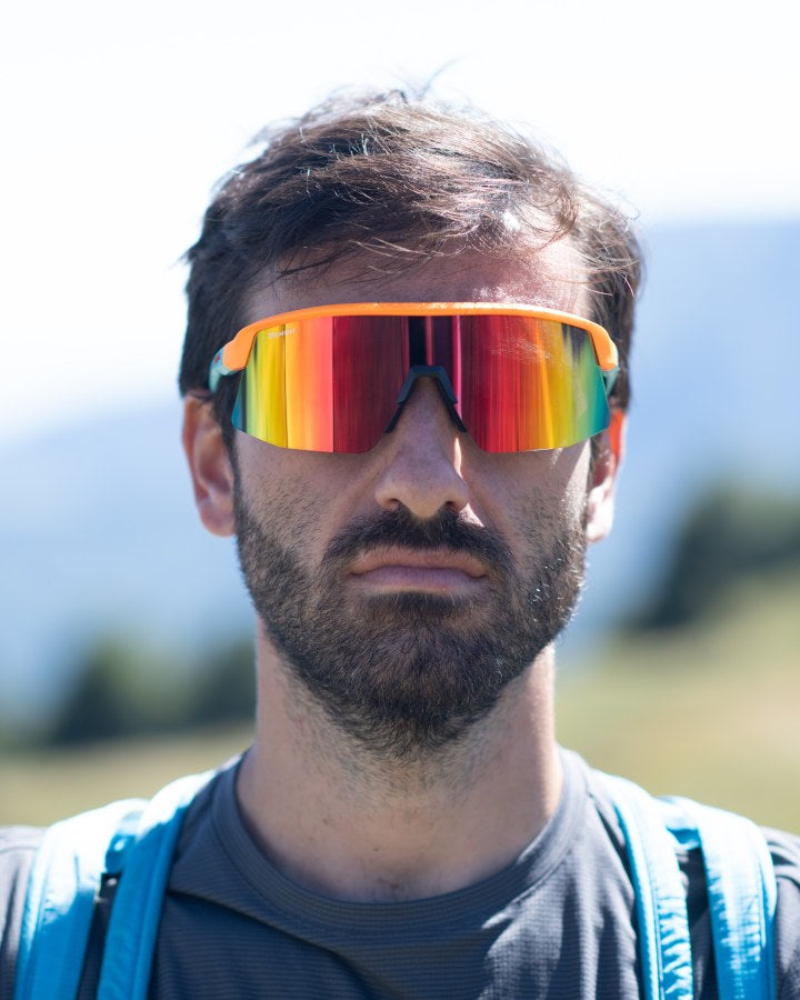 Occhiale da running lente unica specchiata rossa colore arancio fluo modello ROUBAIX